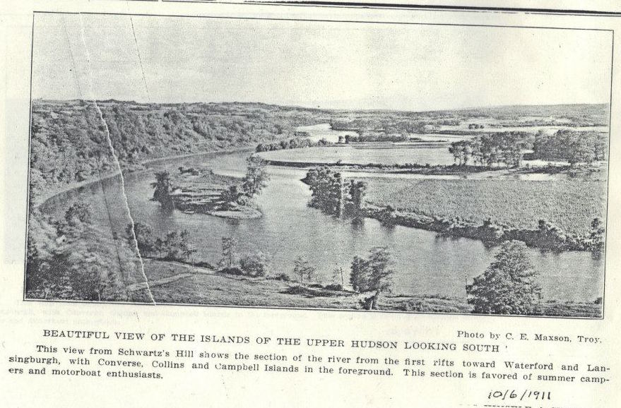 This view from Schwartz's Hill shows the section of the river from the first rifts toward Waterford and Lansingburgh, with Converse, Collins and Campbell Islands in the foreground. This section is favored of summer campers and motorboat enthusiasts.