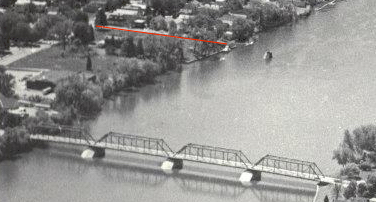 Detail of old photo; Waterford Bridge in foreground, 123rd Street annotated in red.