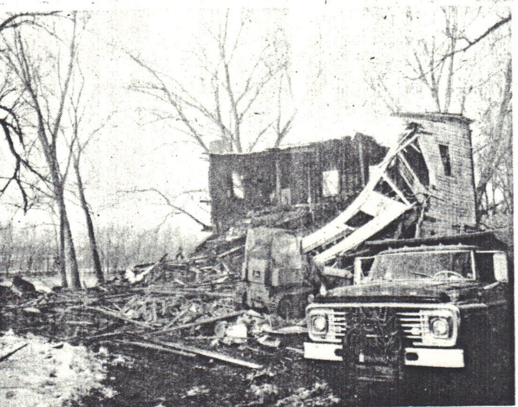 "EYESORE YIELDS TO PARK-The barn [sic] in the above picture will soon be replaced by a riverfront park, thanks to efforts of the local Historical Society." Lansingburgh Voice. January 1973. [Shop, not barn.]