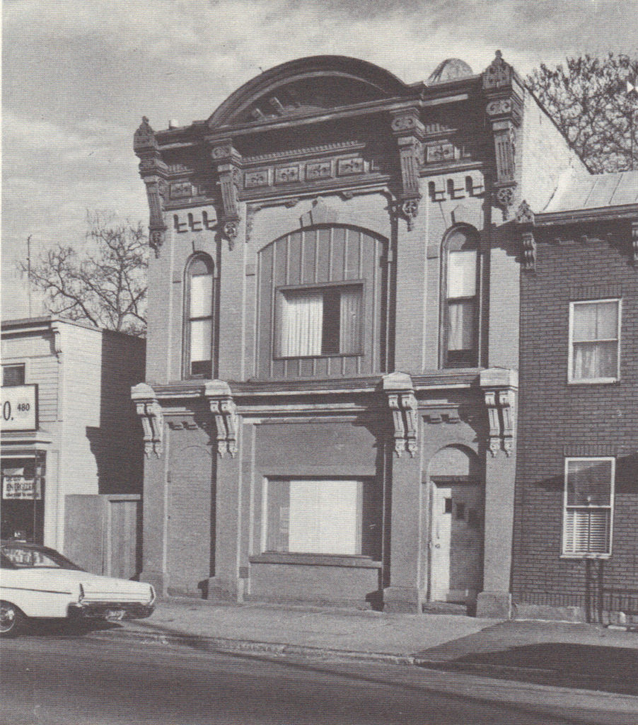 Black and white photograph of facade of former J. Fox Steam Fire Engine Company.